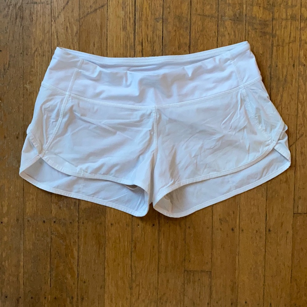 Great condition! White lululemon running shorts